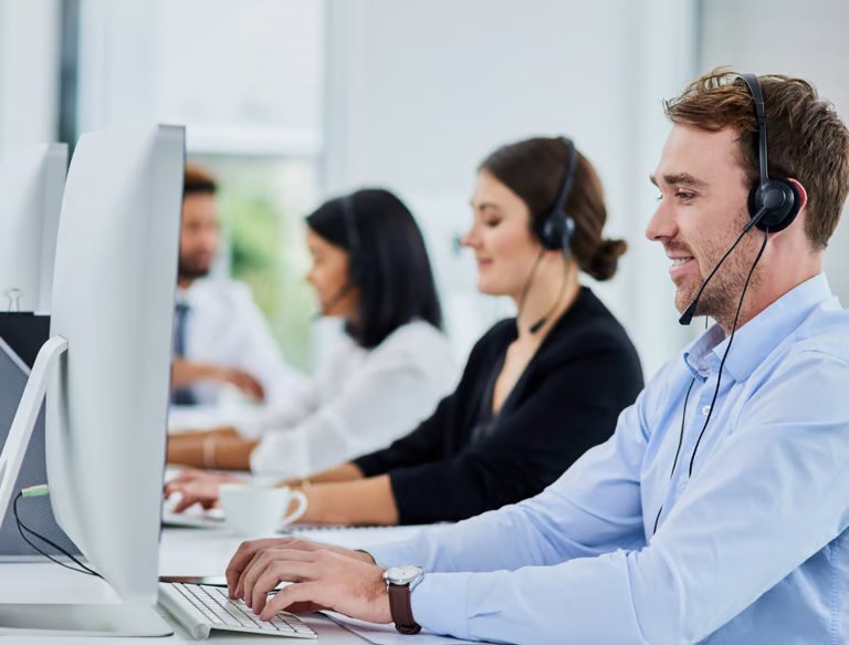 Support team working with headsets